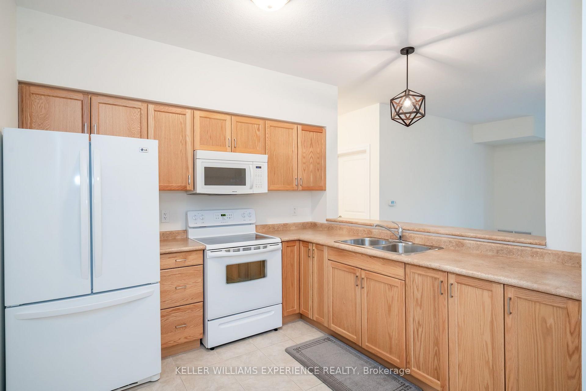 Photo 9 of Unit 103, 19B Yonge Street N, Springwater, Elmvale — HOMEH