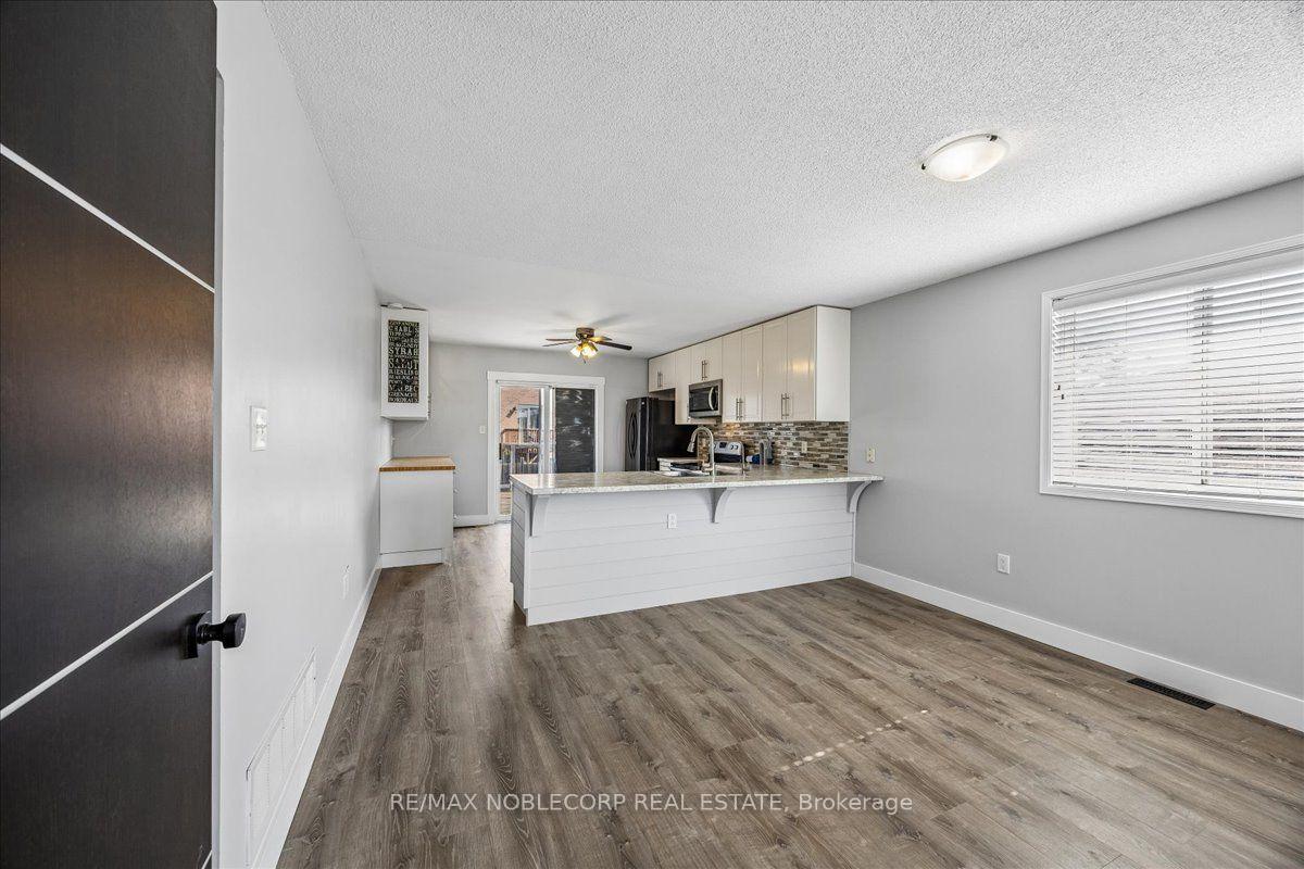 Photo 3 of Unit Main, 210 Dunsmore Lane, Barrie, Georgian Drive — HOMEH