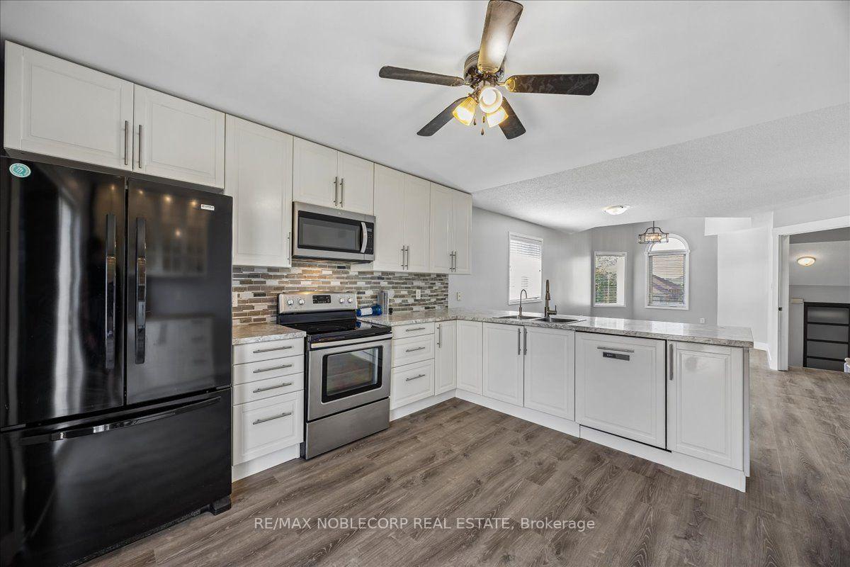 Photo 5 of Unit Main, 210 Dunsmore Lane, Barrie, Georgian Drive — HOMEH
