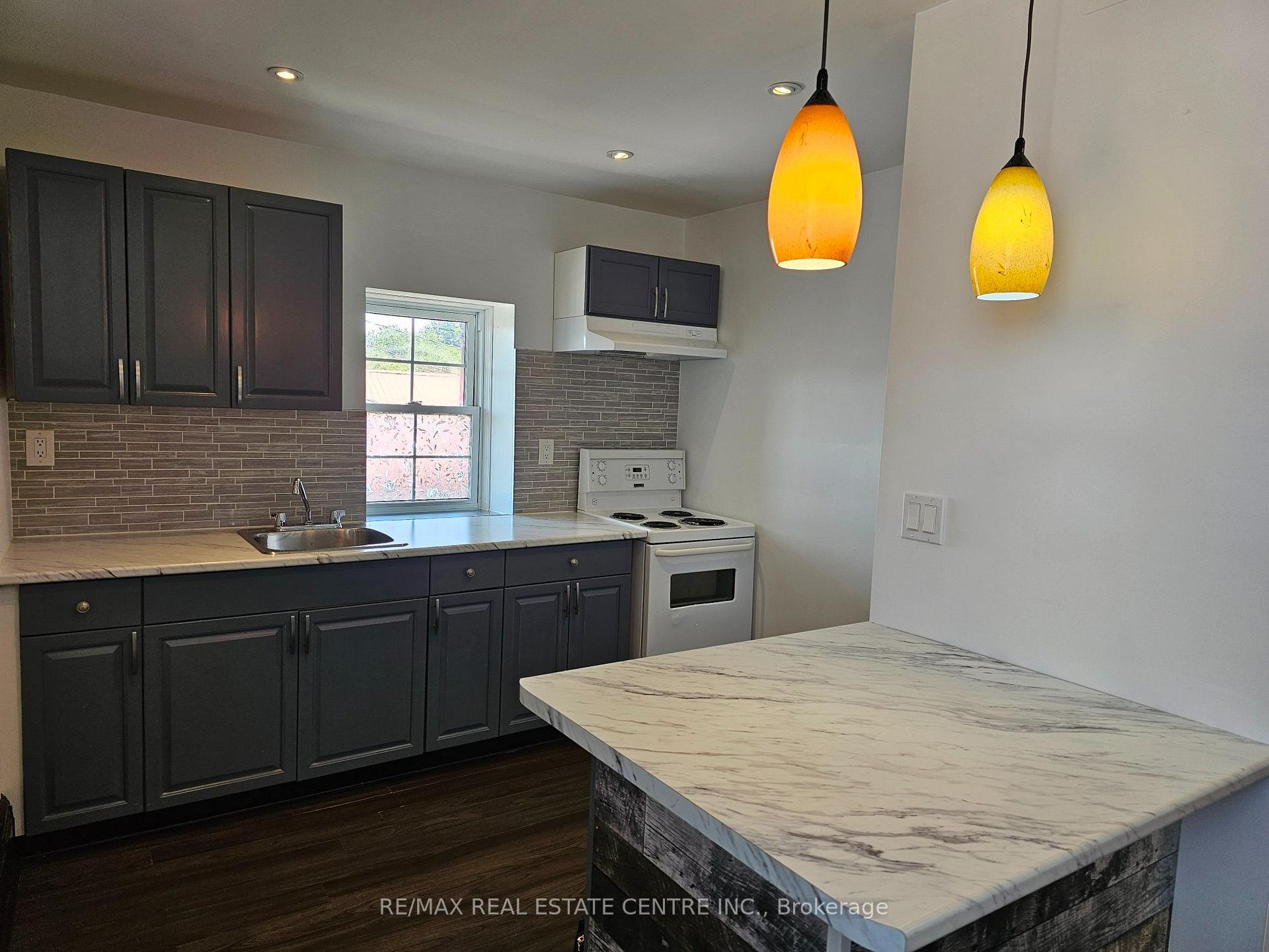 Photo 2 of Unit 1, 1-3 Mill Street, Quinte West, Frankford Ward — HOMEH