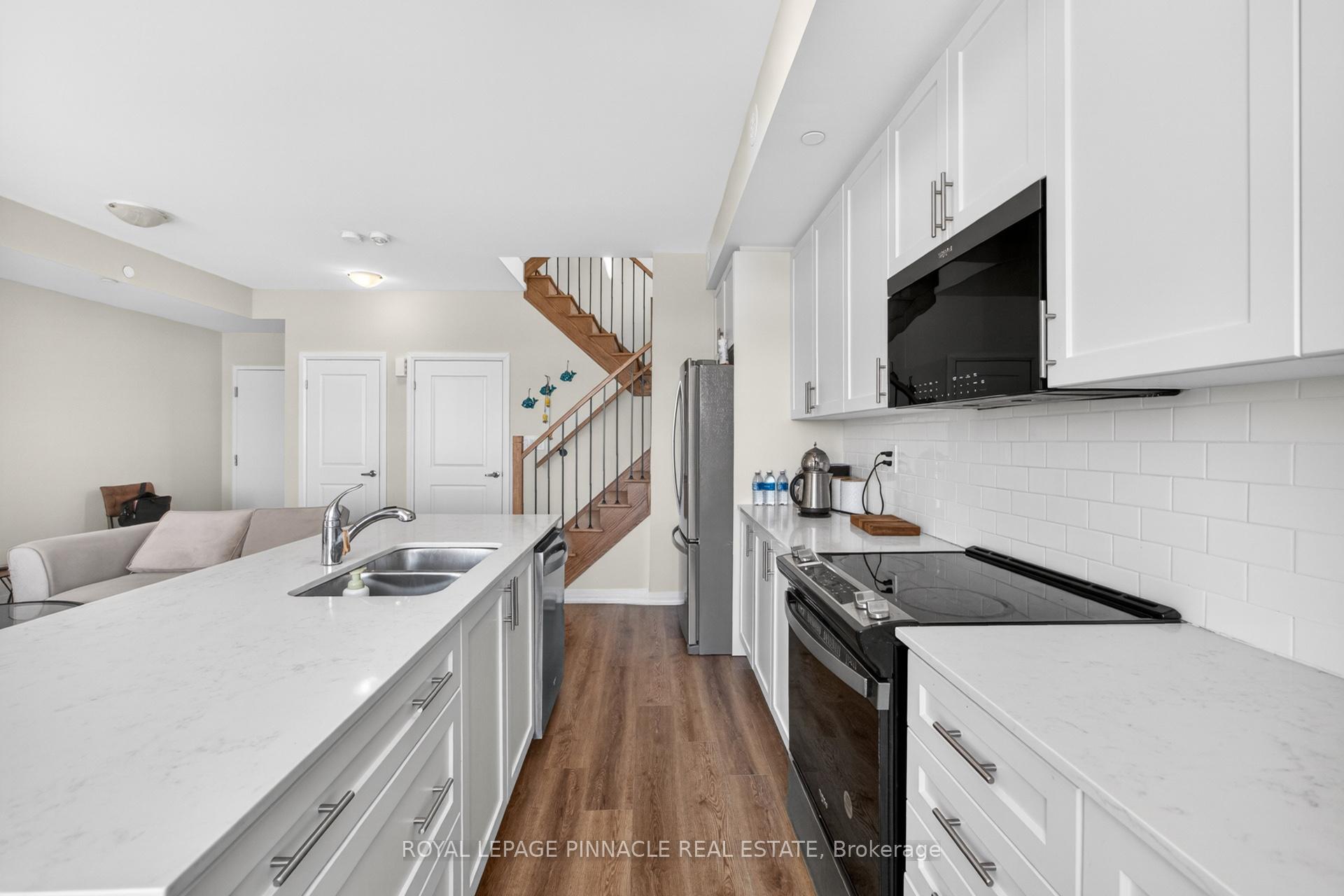 Photo 10 of Unit 103, 1585 Rose Way, Milton, Cobban — HOMEH