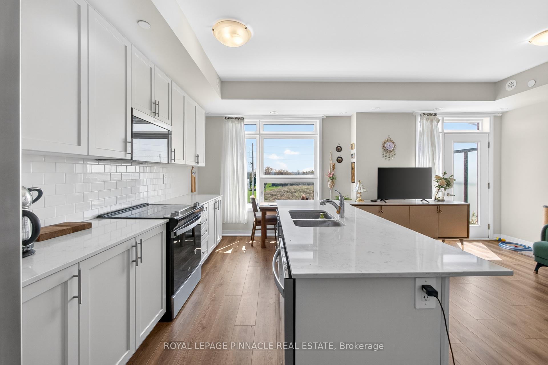 Photo 11 of Unit 103, 1585 Rose Way, Milton, Cobban — HOMEH