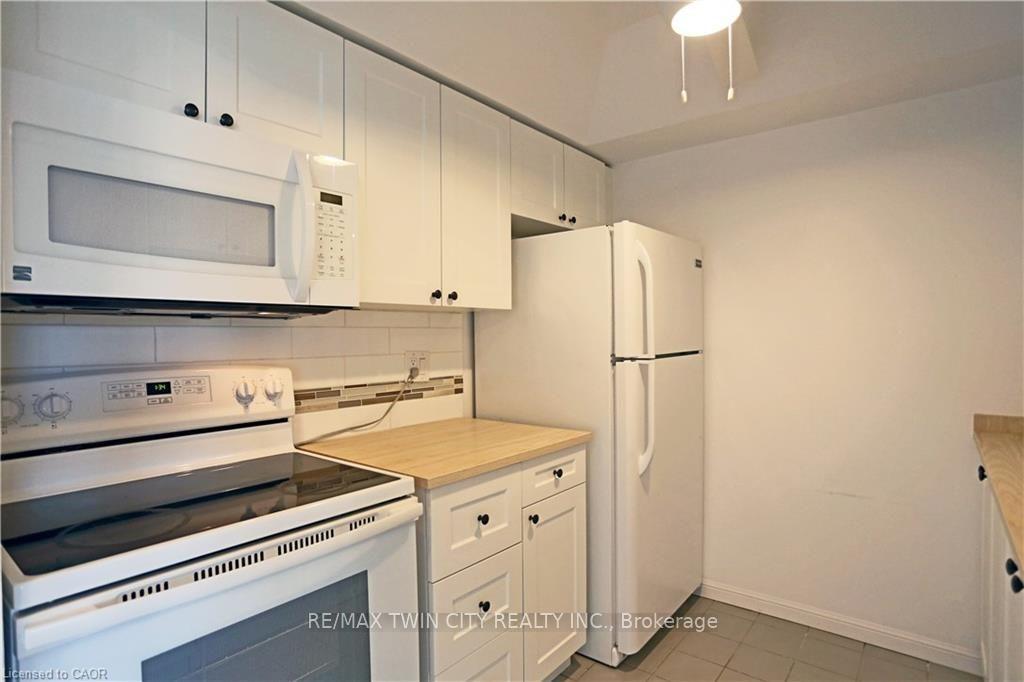 Photo 4 of Unit 411, 107 Bagot Street, Guelph, Junction/Onward Willow — HOMEH