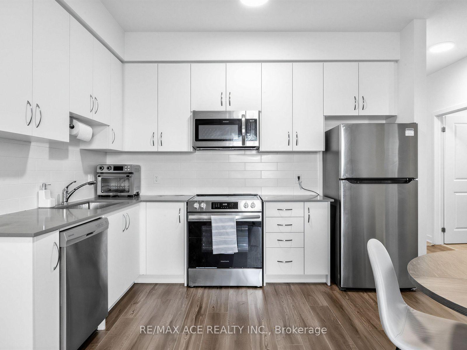 Photo 11 of Unit 418, 385 Arctic Red Drive N, Oshawa, Windfields — HOMEH