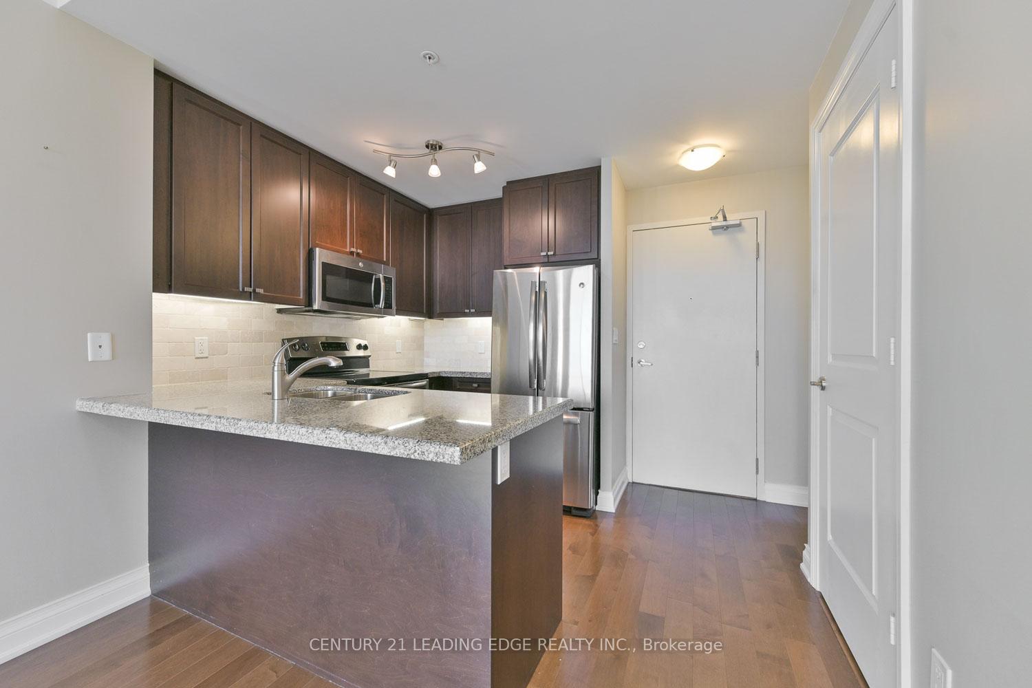 Photo 5 of Unit 604, 68 Main Street N, Markham, Old Markham Village — HOMEH