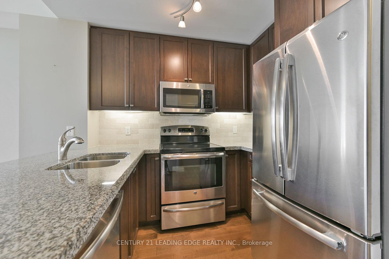 Photo 6 of Unit 604, 68 Main Street N, Markham, Old Markham Village — HOMEH