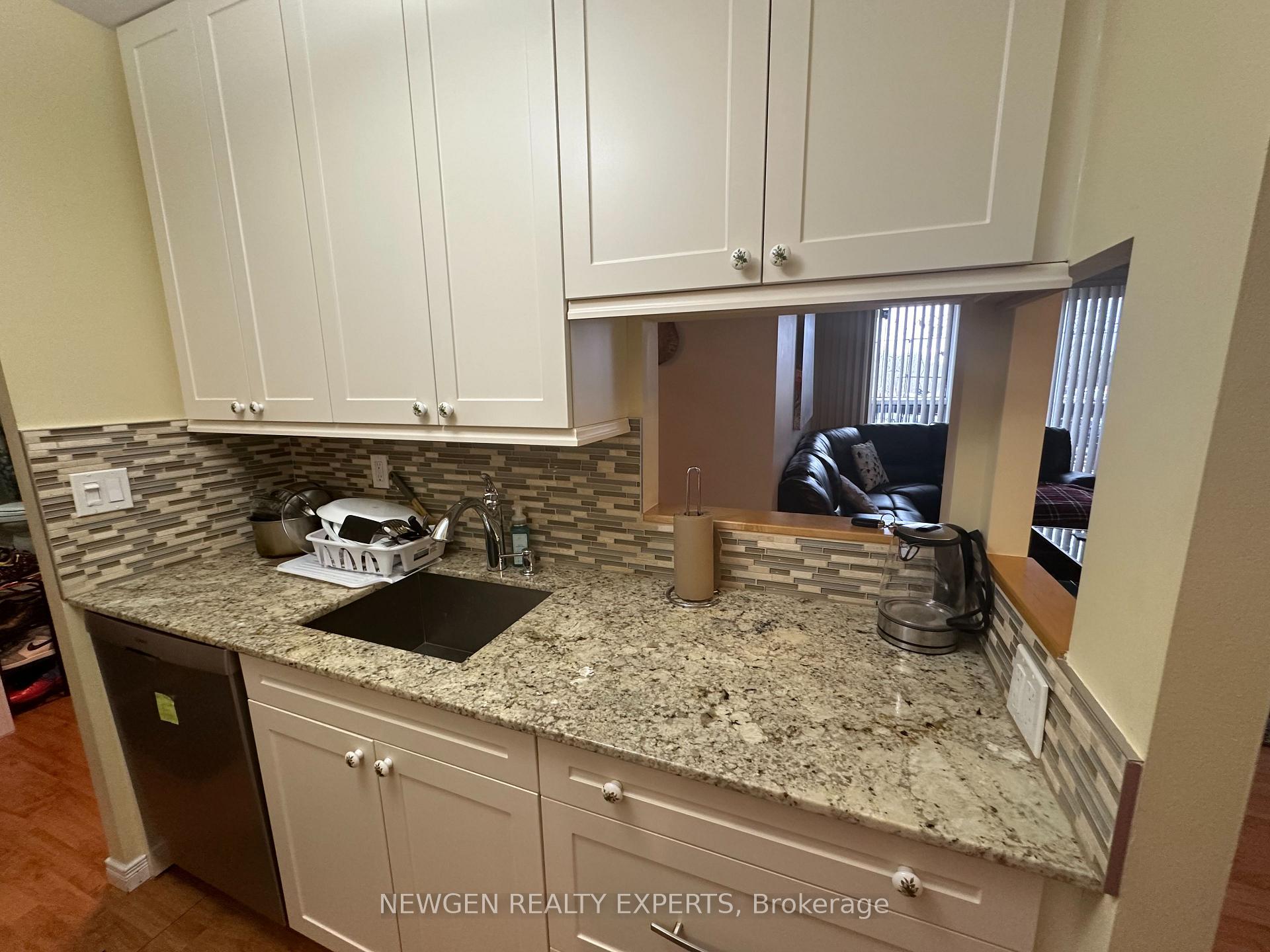 Photo 4 of Unit 112, 334 Queen Mary Road, Kingston, West of Sir John A. Blvd — HOMEH