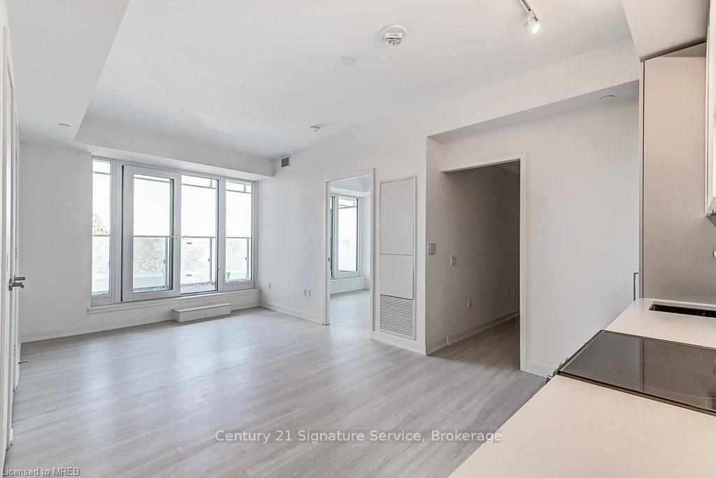 Photo 4 of Unit 214, 3883 Quartz Road, Mississauga, City Centre — HOMEH