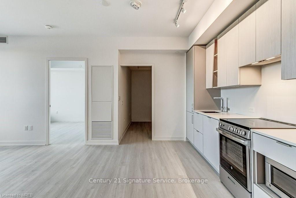 Photo 5 of Unit 214, 3883 Quartz Road, Mississauga, City Centre — HOMEH