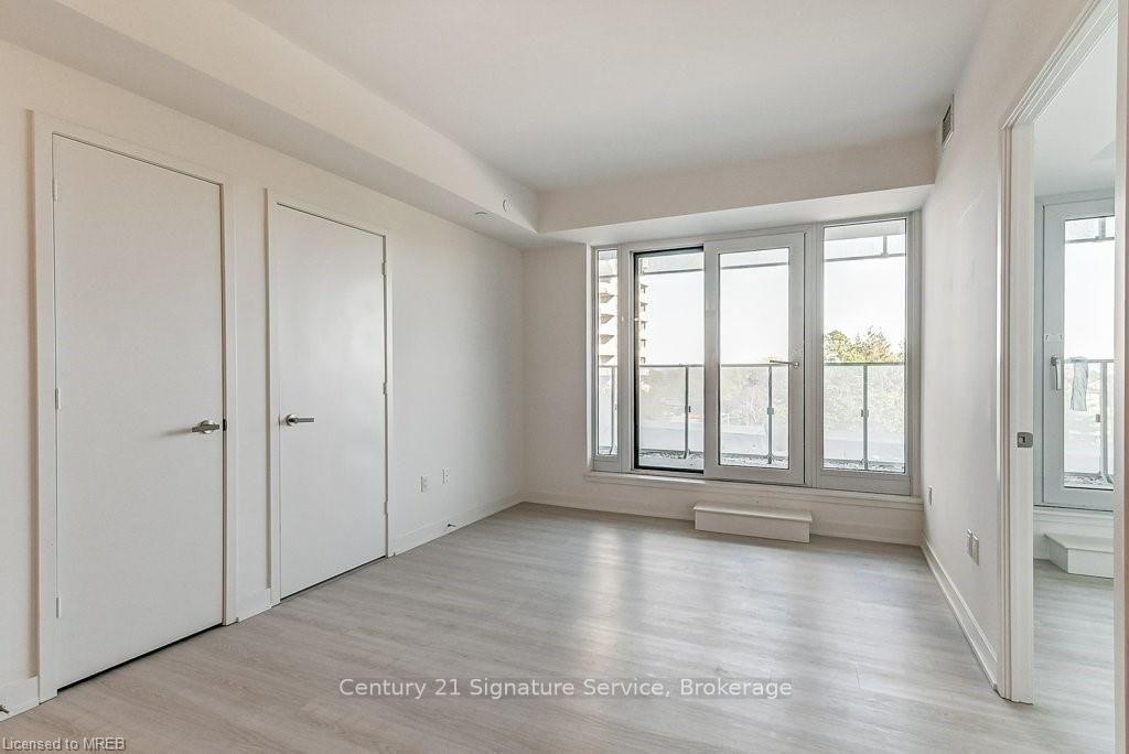 Photo 7 of Unit 214, 3883 Quartz Road, Mississauga, City Centre — HOMEH
