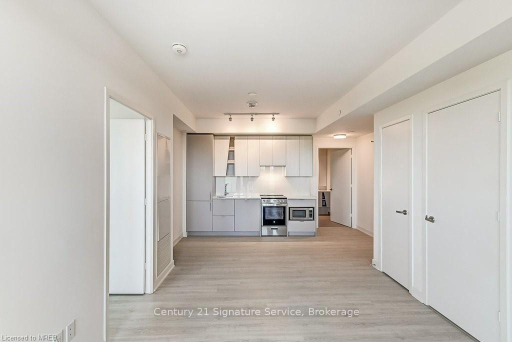 Photo 9 of Unit 214, 3883 Quartz Road, Mississauga, City Centre — HOMEH