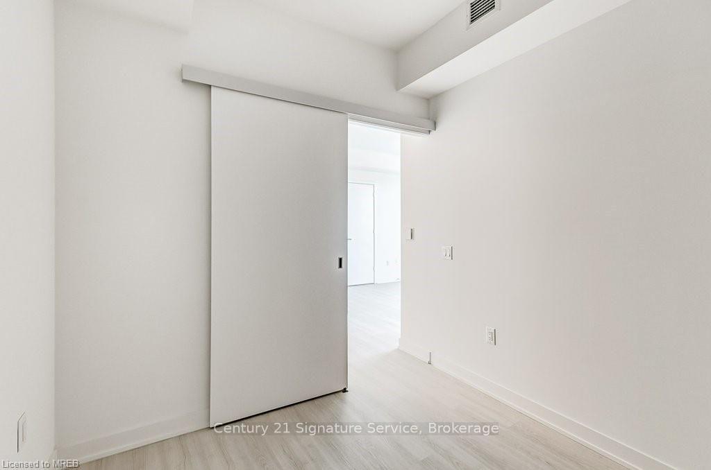 Photo 11 of Unit 214, 3883 Quartz Road, Mississauga, City Centre — HOMEH