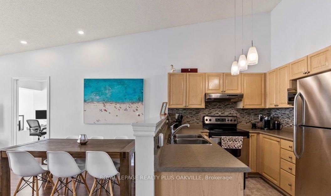 Photo 5 of Unit 403, 2035 Appleby Line, Burlington, Uptown — HOMEH