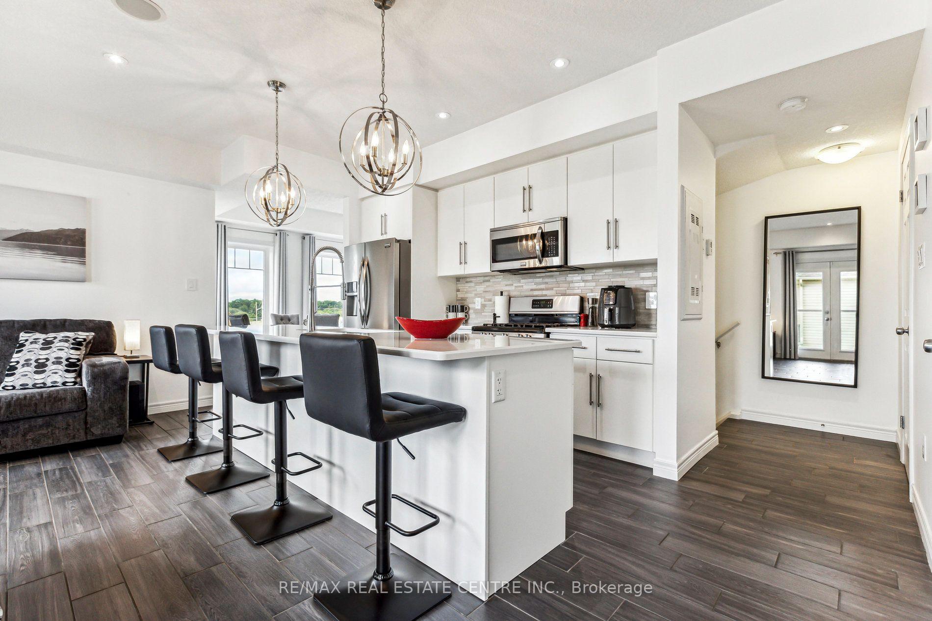 Photo 11 of Unit A1, 70 Willowrun Drive E, Kitchener, Idlewood/Lackner Woods — HOMEH