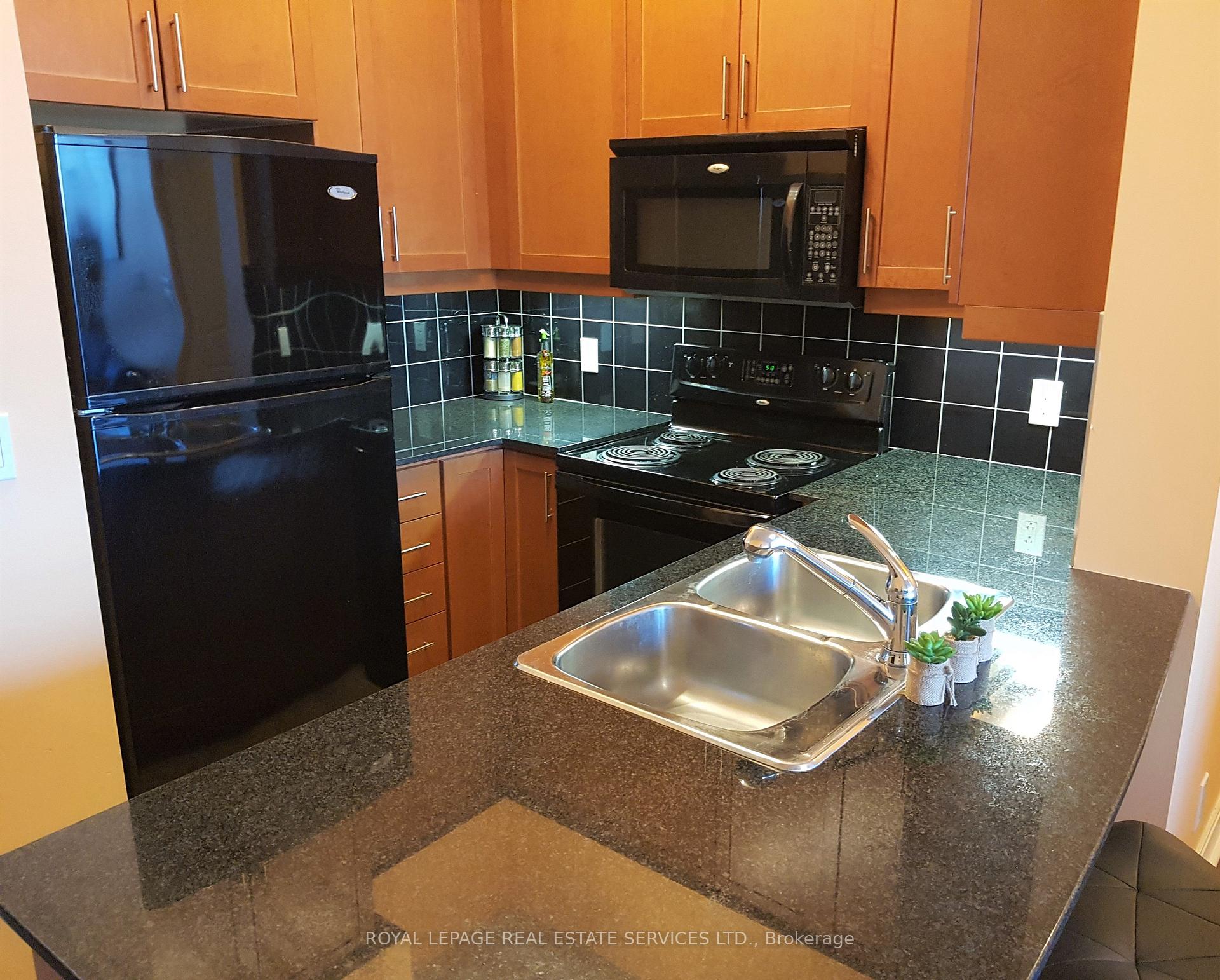 Photo 4 of Unit 2401, 90 Absolute Avenue, Mississauga, City Centre — HOMEH