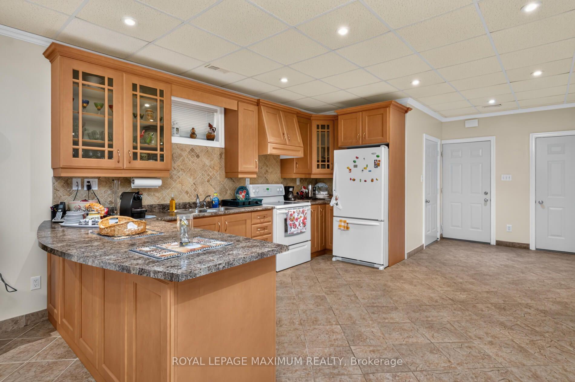 Photo 32 of 378 Rustic Road, North York, Maple Leaf — HOMEH