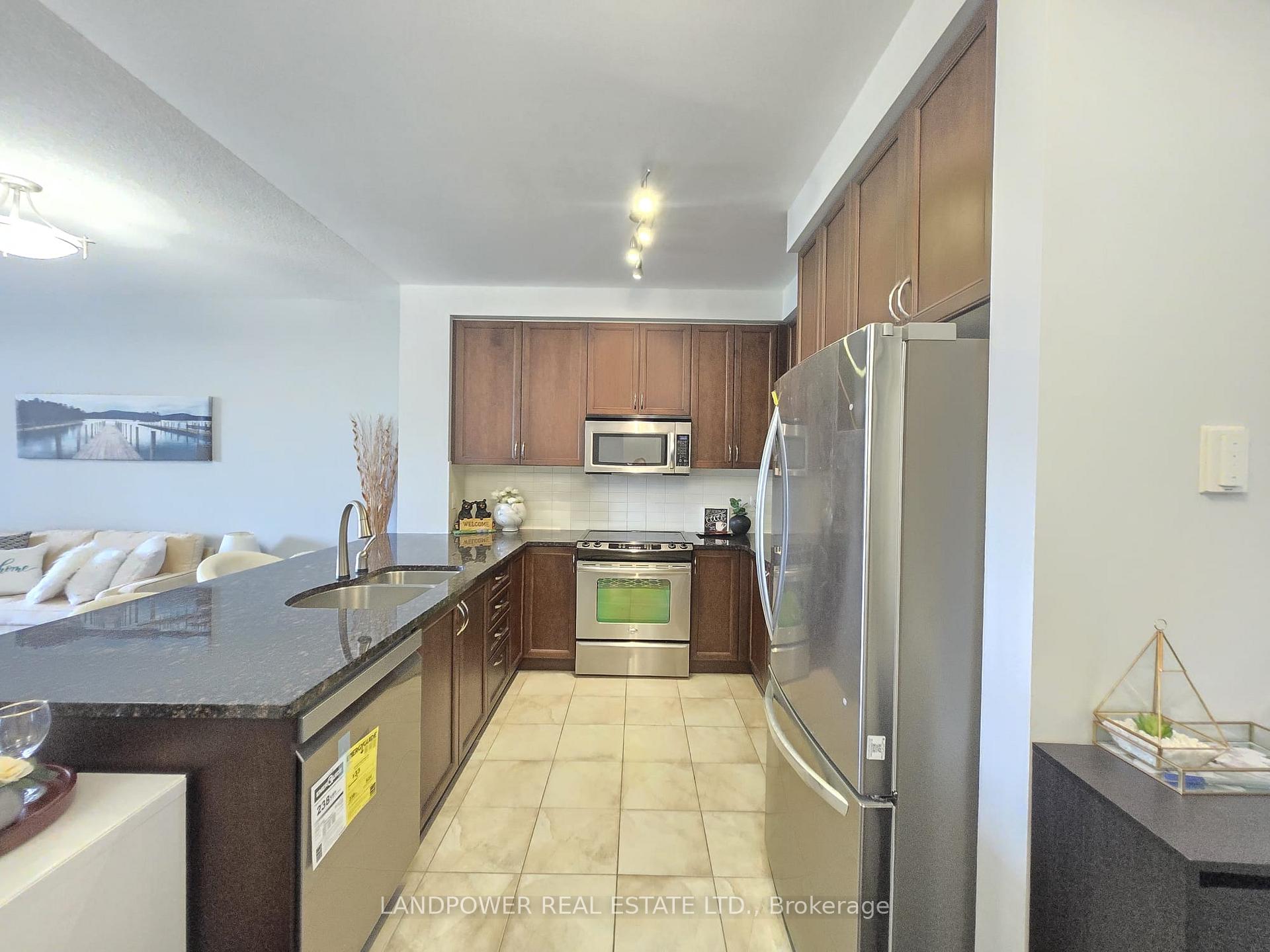 Photo 13 of Unit 208, 9245 Jane Street, Vaughan, Maple — HOMEH