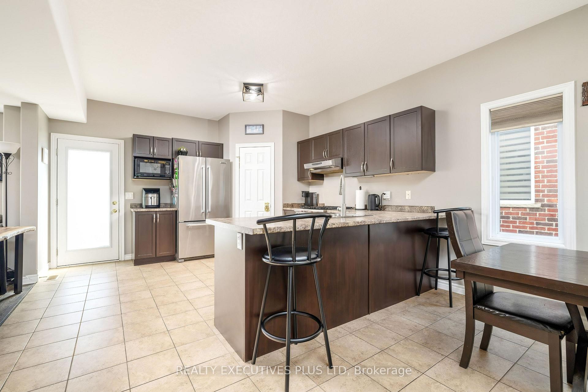 Photo 7 of 56 Dinnick Crescent, Orangeville — HOMEH