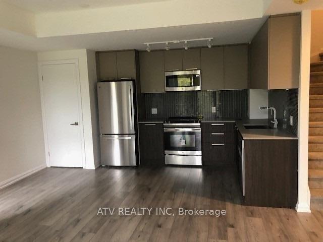 Photo 3 of Unit TH17, 10 Brin Drive, Etobicoke, Edenbridge-Humber Valley — HOMEH