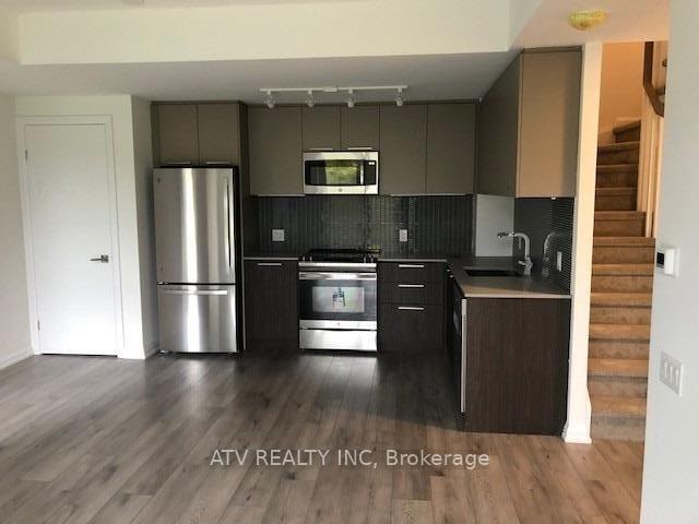 Photo 5 of Unit TH17, 10 Brin Drive, Etobicoke, Edenbridge-Humber Valley — HOMEH