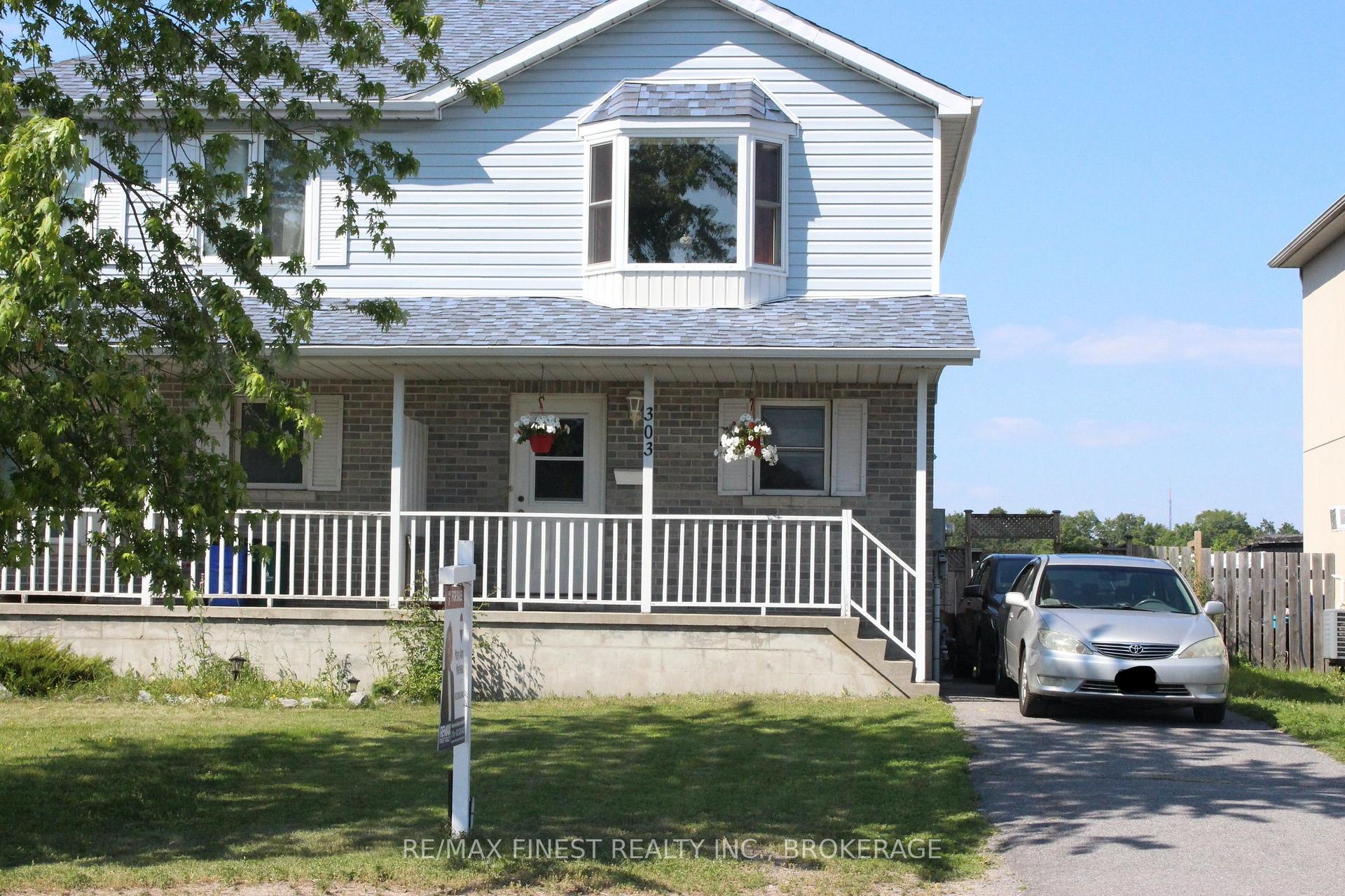 Photo 1 of 303 Conacher Drive, Kingston, Rideau — HOMEH