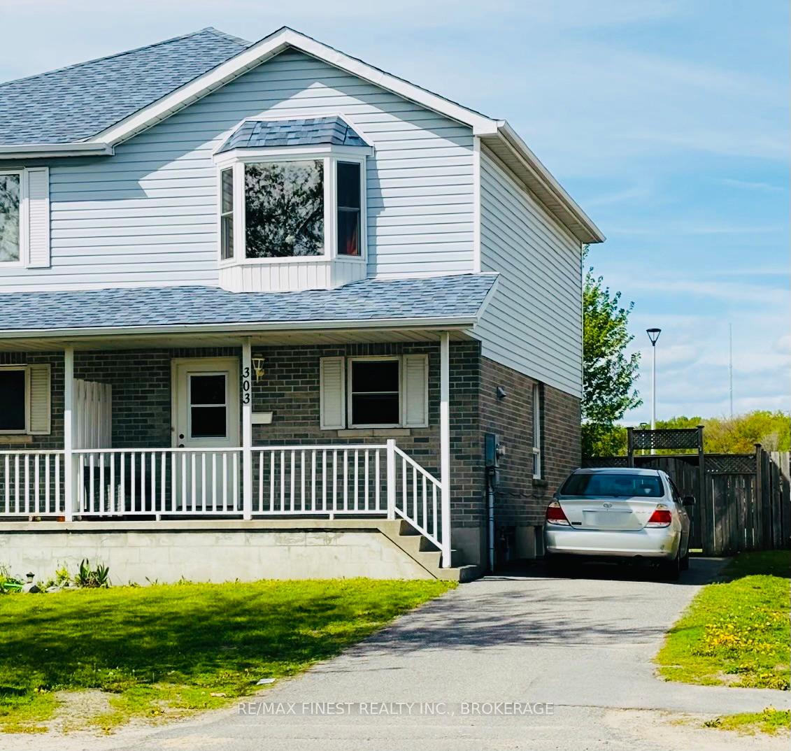 Photo 2 of 303 Conacher Drive, Kingston, Rideau — HOMEH