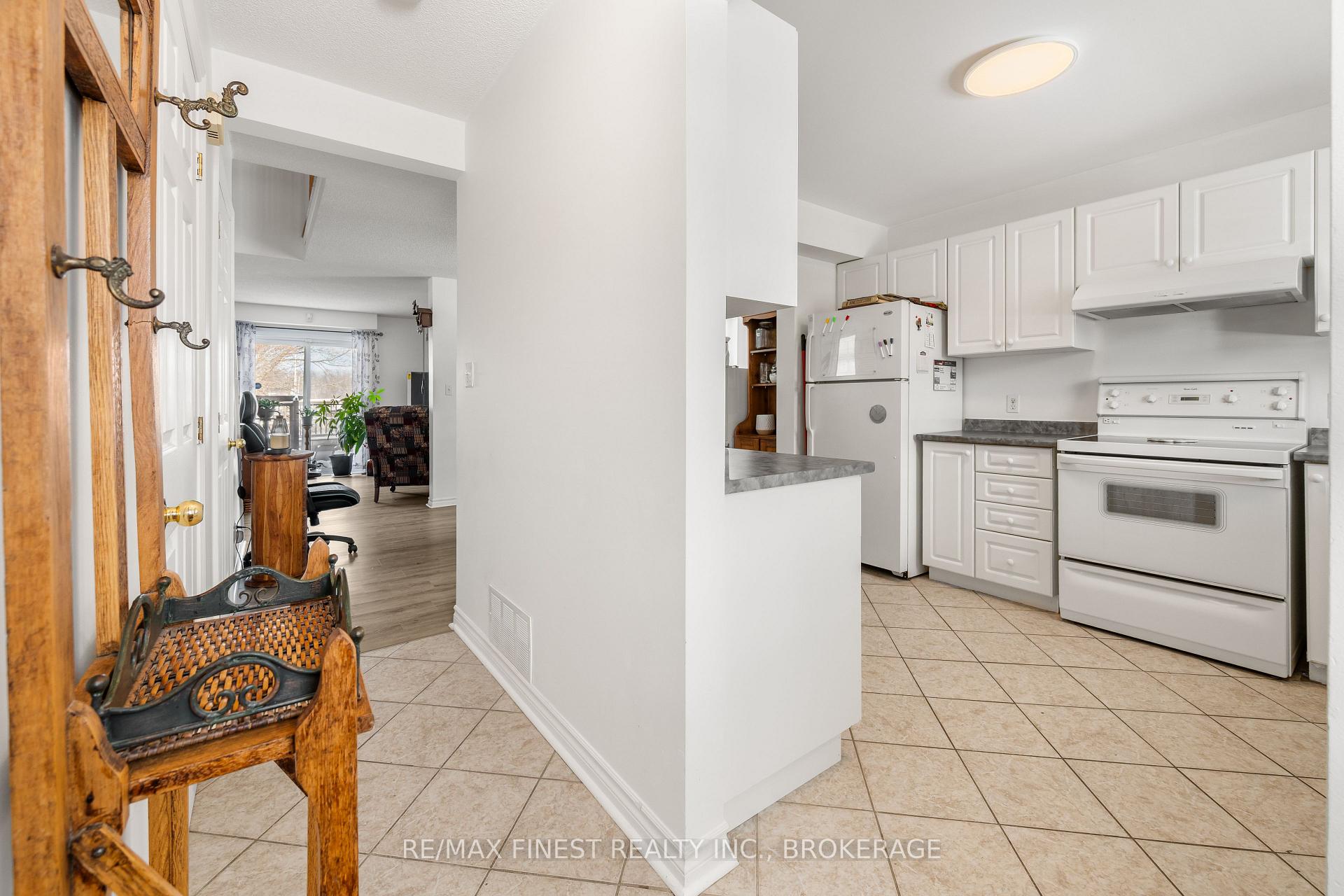 Photo 4 of 303 Conacher Drive, Kingston, Rideau — HOMEH