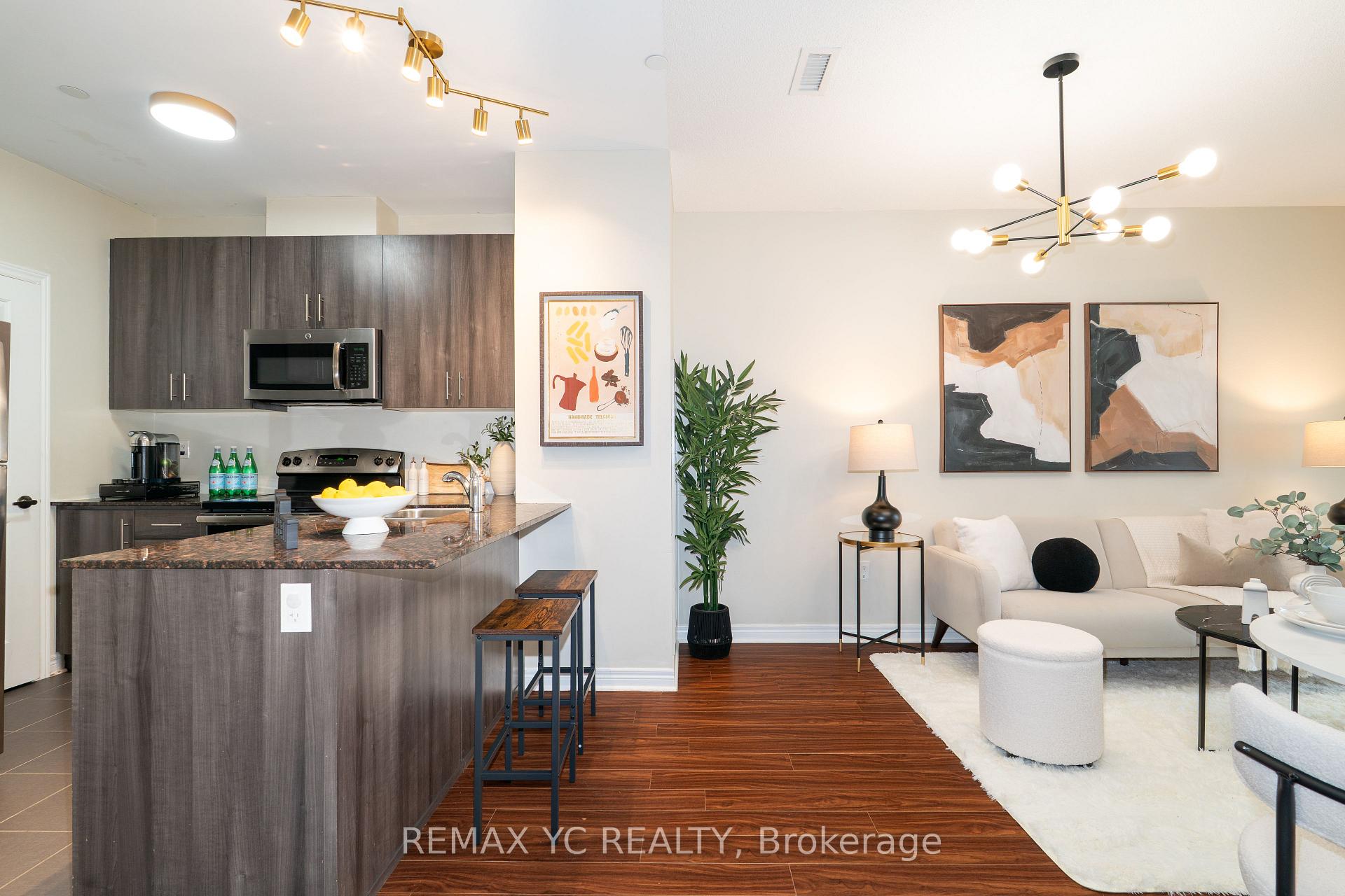 Photo 3 of Unit 102, 7768 Kennedy Road, Markham, Milliken Mills West — HOMEH