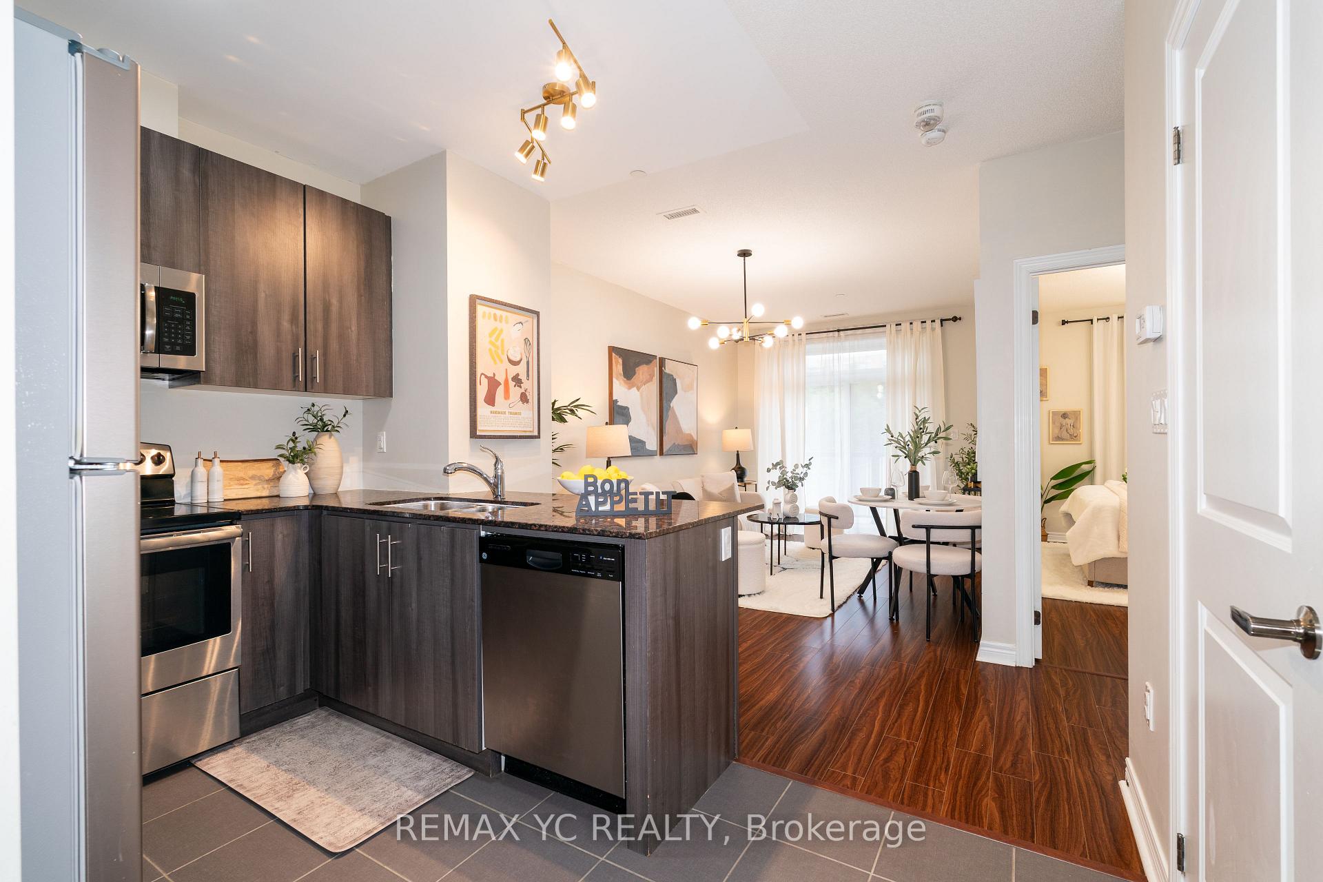 Photo 4 of Unit 102, 7768 Kennedy Road, Markham, Milliken Mills West — HOMEH