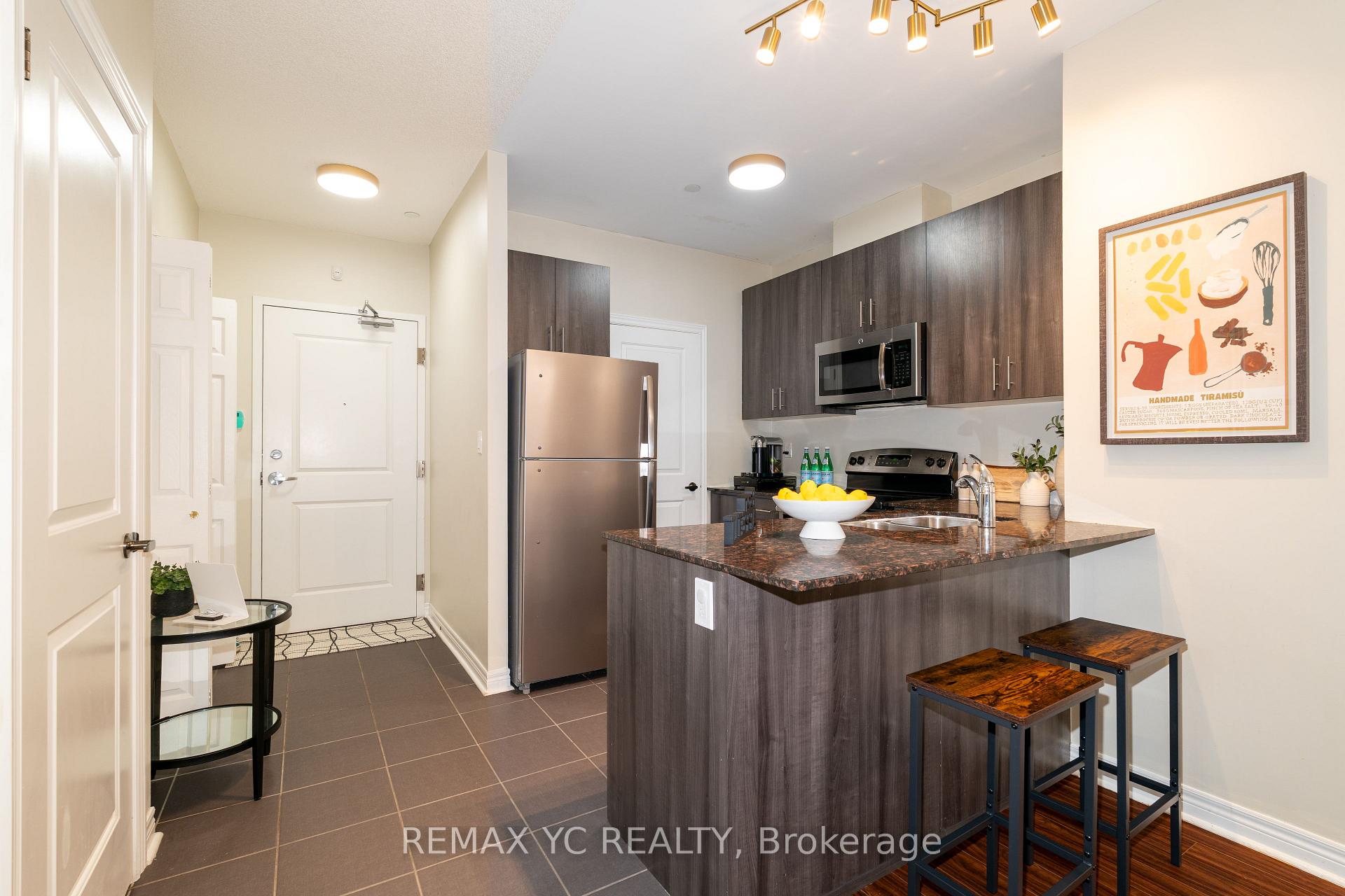 Photo 5 of Unit 102, 7768 Kennedy Road, Markham, Milliken Mills West — HOMEH