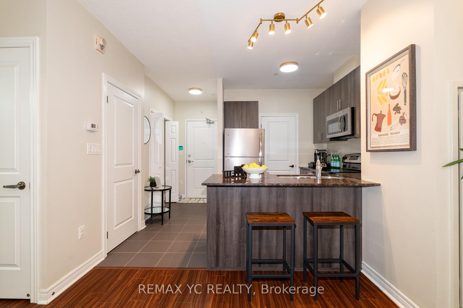 Photo 6 of Unit 102, 7768 Kennedy Road, Markham, Milliken Mills West — HOMEH