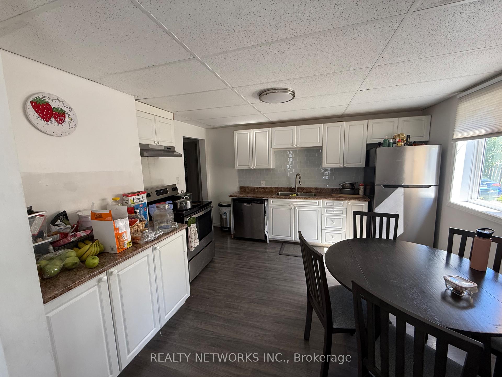 Photo 5 of 30 Golden Avenue, Timmins, TM - Outside East — HOMEH