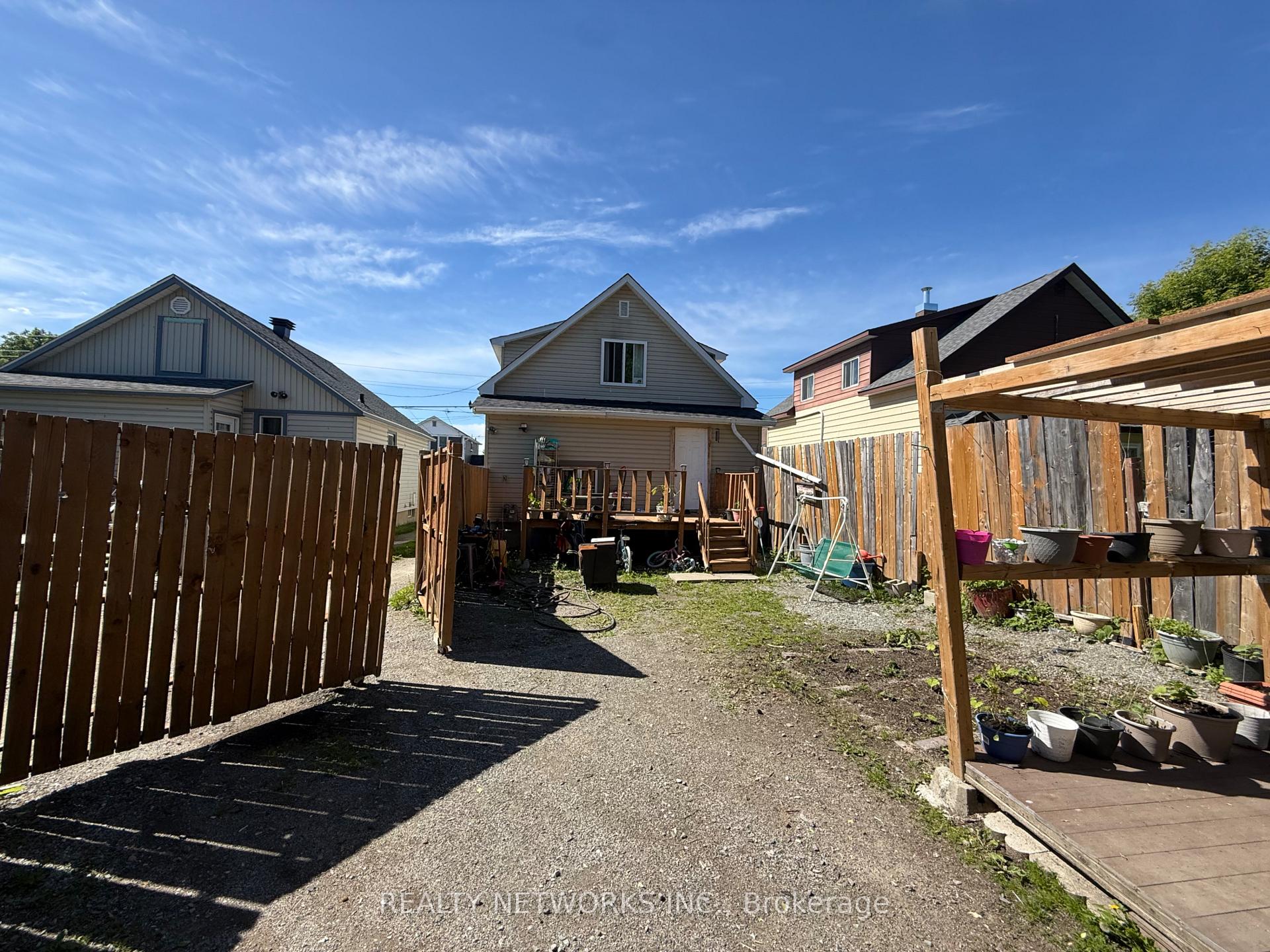 Photo 12 of 30 Golden Avenue, Timmins, TM - Outside East — HOMEH