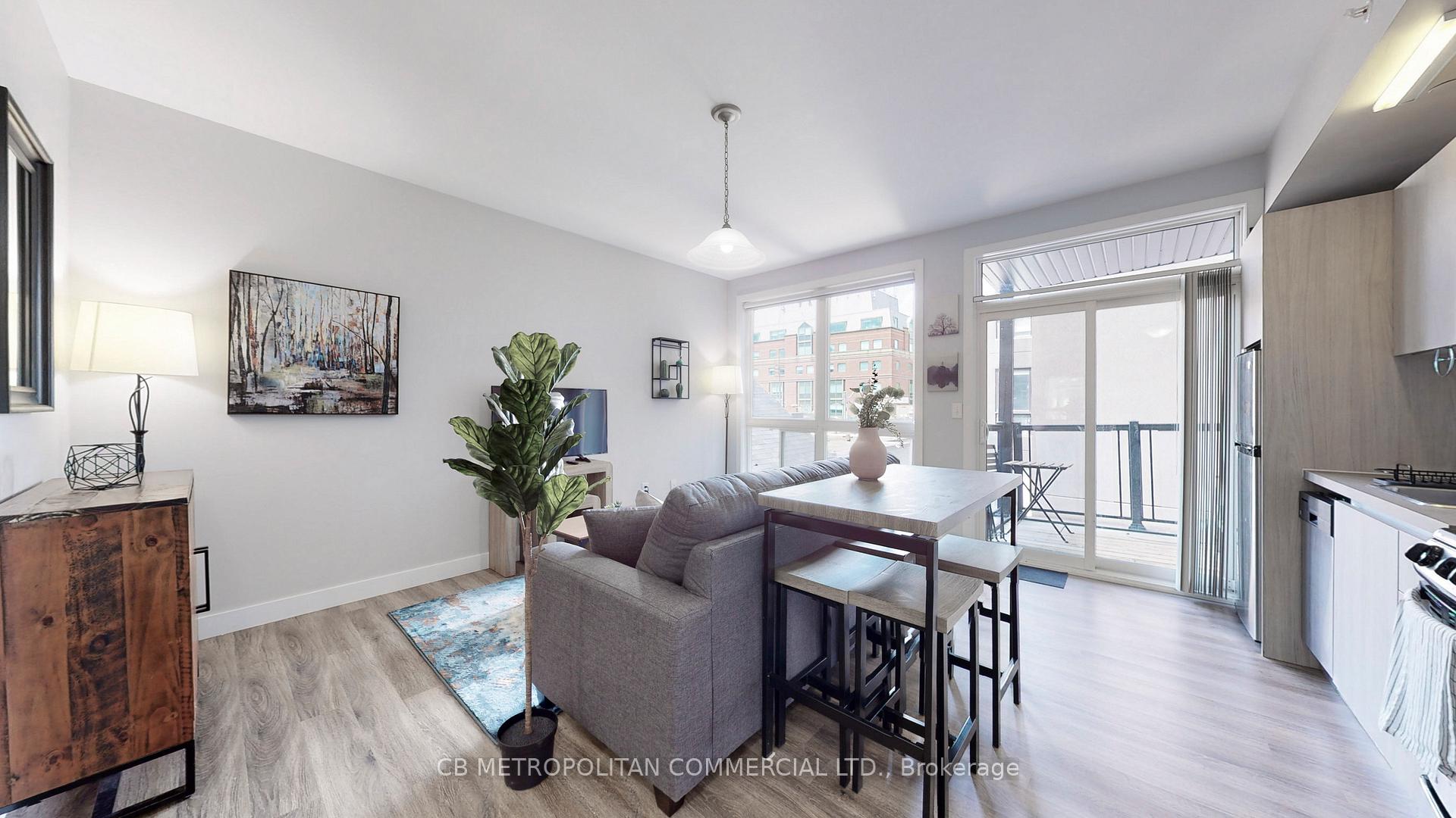 Photo 2 of Unit 104, 335 College Street, Toronto, Kensington-Chinatown — HOMEH