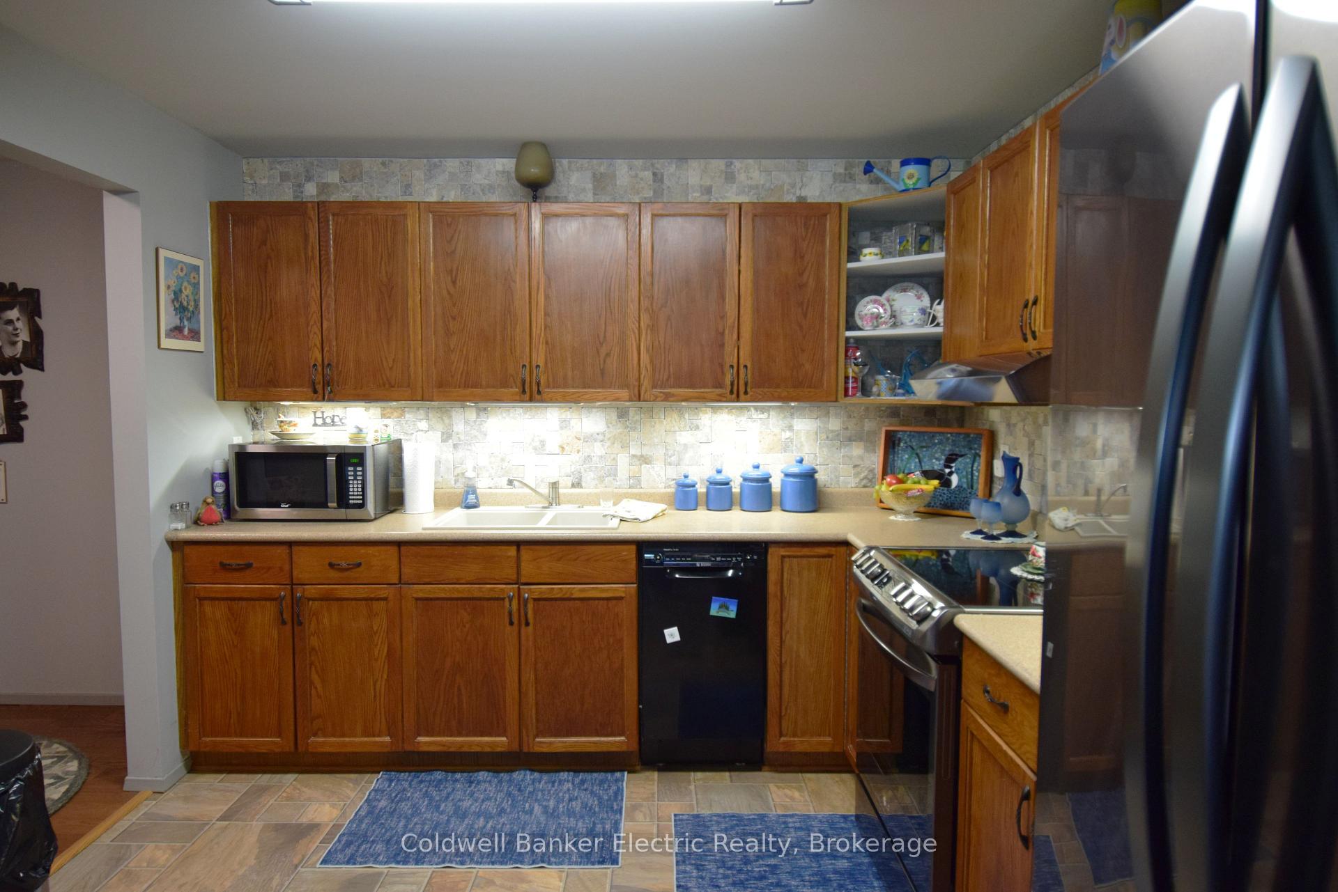 Photo 11 of Unit 104, 2418 Mountland Drive, Peterborough, Monaghan Ward 2 — HOMEH
