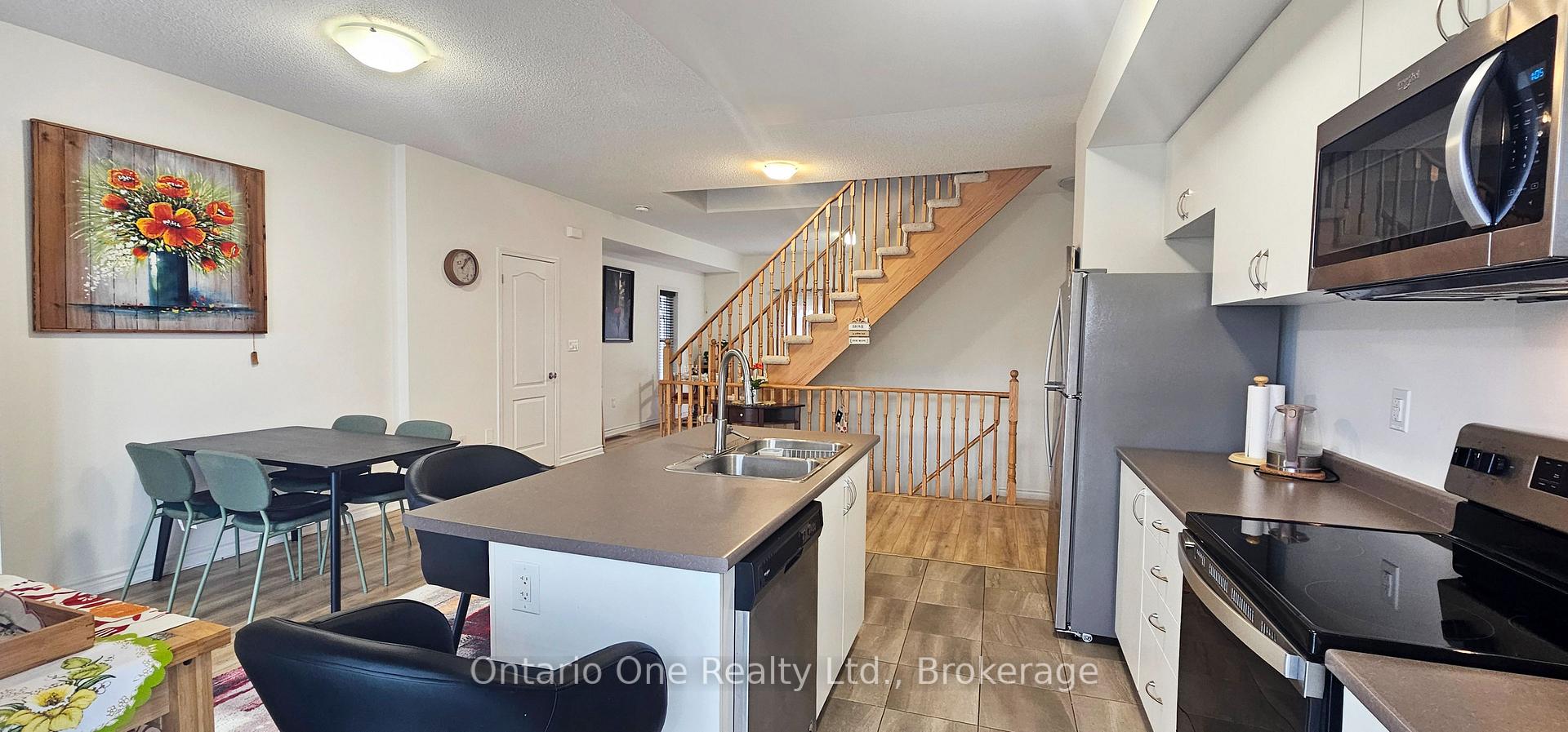 Photo 5 of 24 Surf Drive, Wasaga Beach — HOMEH