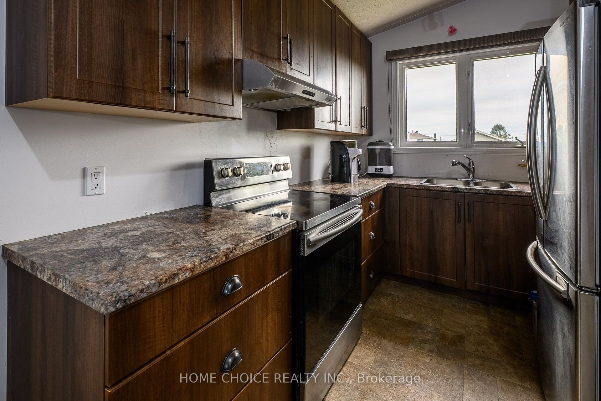 Photo 22 of 588 Melrose Boulevard, Timmins, TNW - Upper Melrose — HOMEH