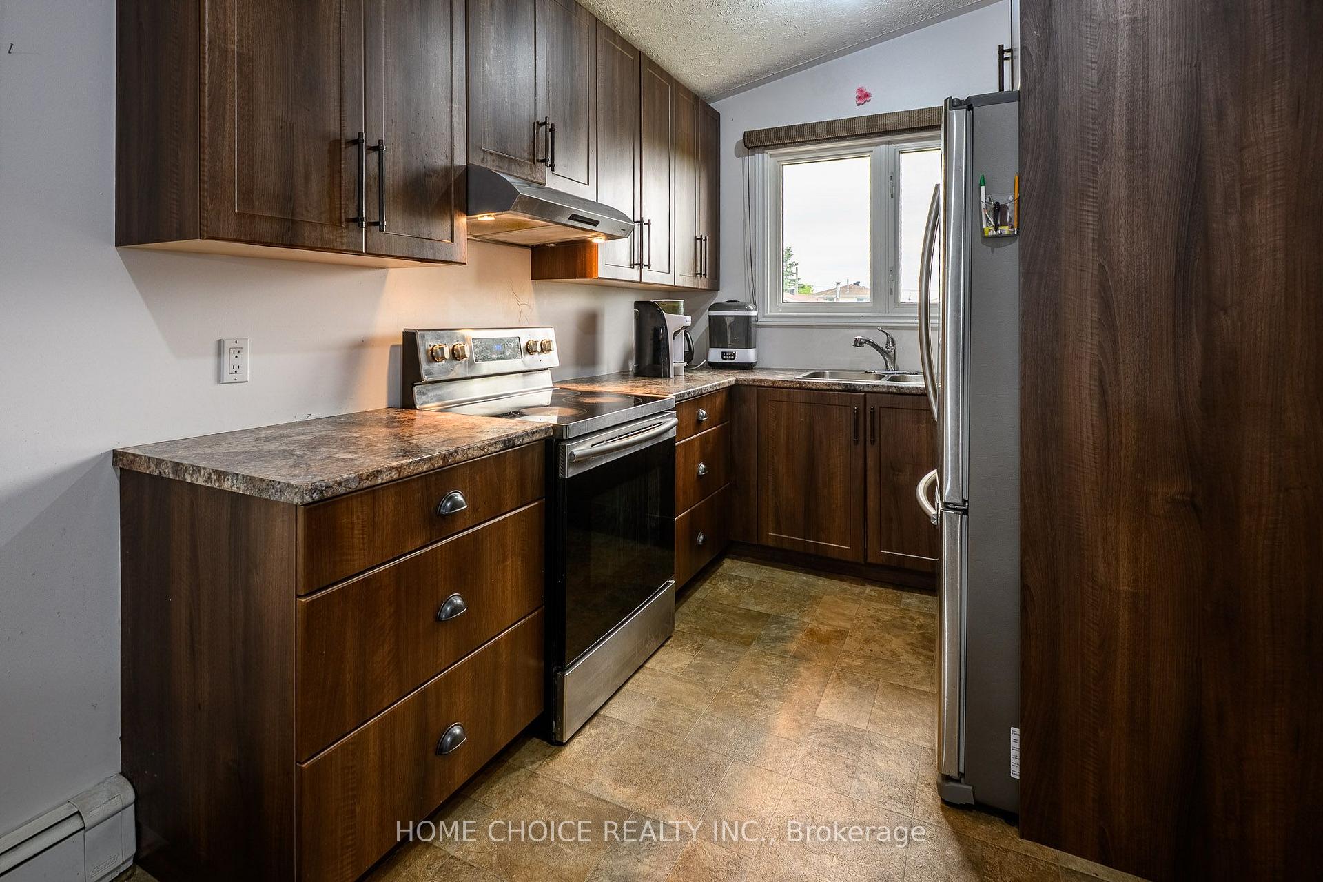 Photo 24 of 588 Melrose Boulevard, Timmins, TNW - Upper Melrose — HOMEH