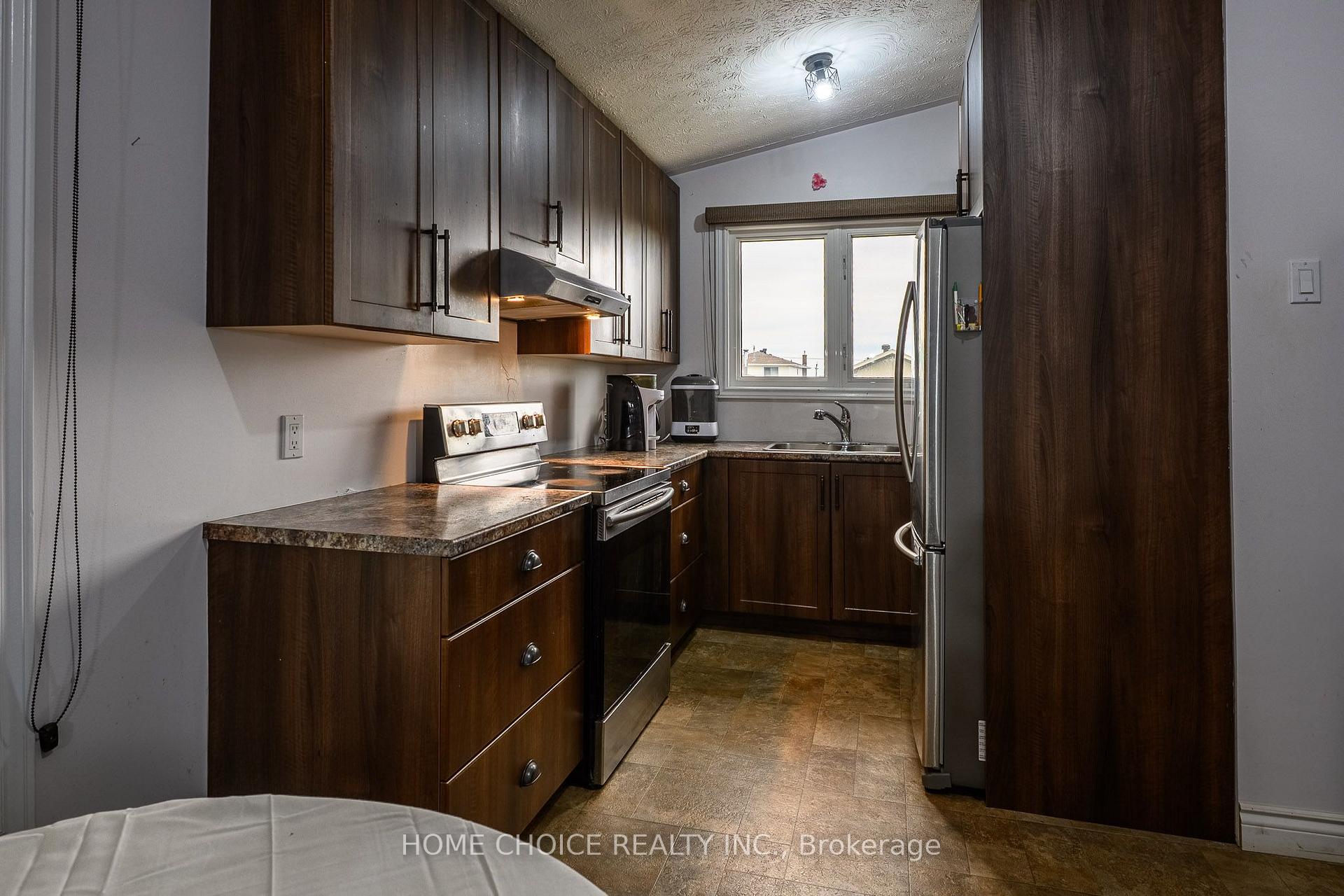 Photo 25 of 588 Melrose Boulevard, Timmins, TNW - Upper Melrose — HOMEH