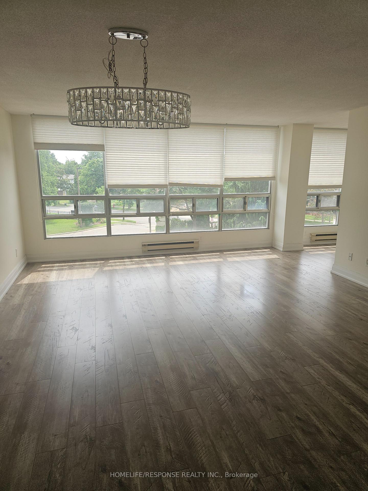 Photo 3 of Unit 308, 310 Mill Street S, Brampton, Brampton South — HOMEH