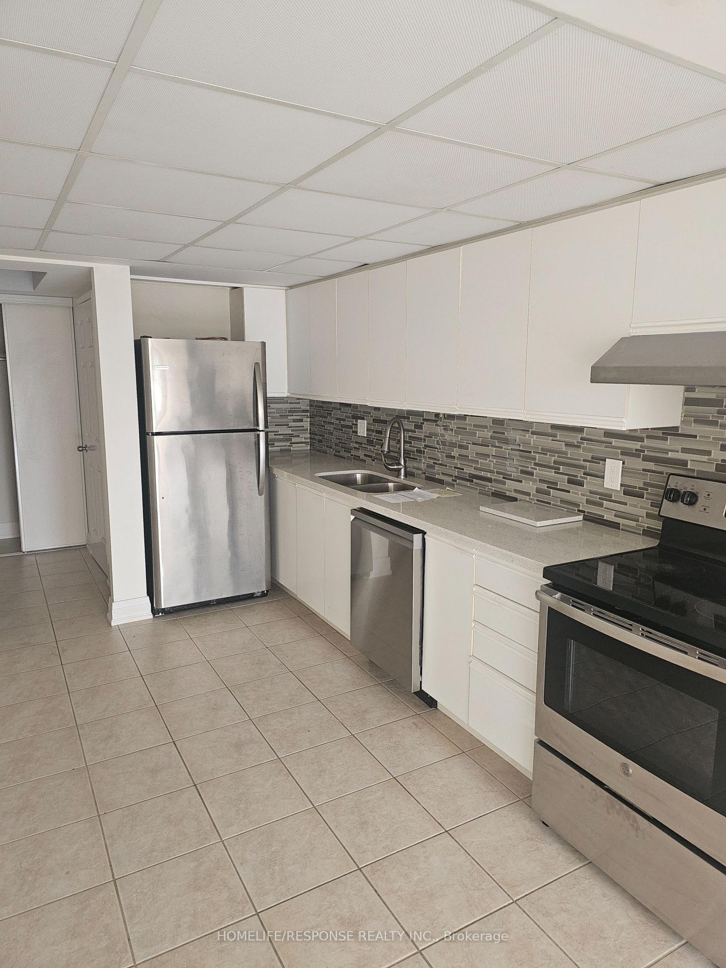 Photo 5 of Unit 308, 310 Mill Street S, Brampton, Brampton South — HOMEH