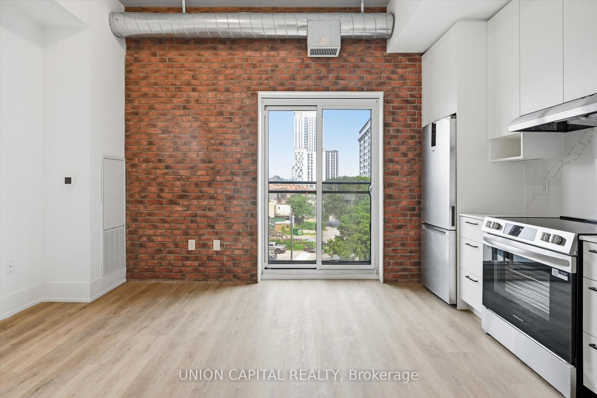 Photo 4 of Unit 406, 206 King Street W, Hamilton, Central — HOMEH