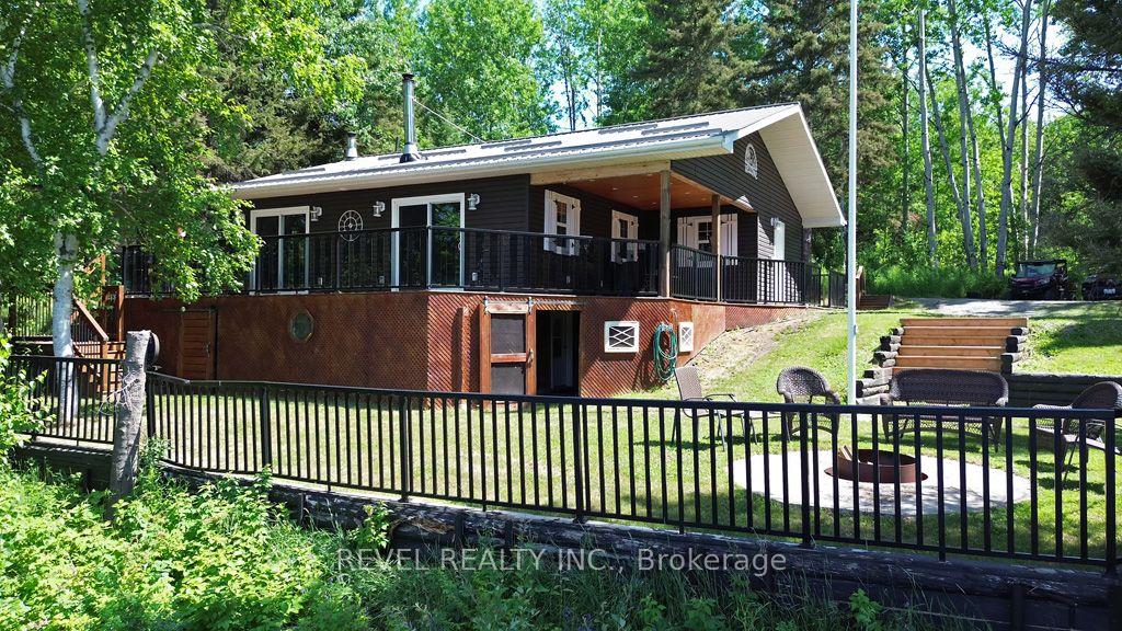 Photo 4 of 260 Racicot Road, Timmins, TM - Outside East — HOMEH