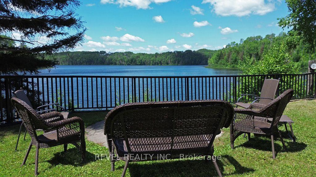 Photo 10 of 260 Racicot Road, Timmins, TM - Outside East — HOMEH