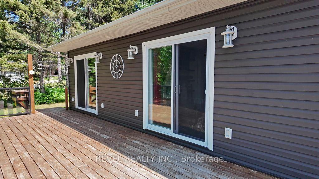 Photo 12 of 260 Racicot Road, Timmins, TM - Outside East — HOMEH