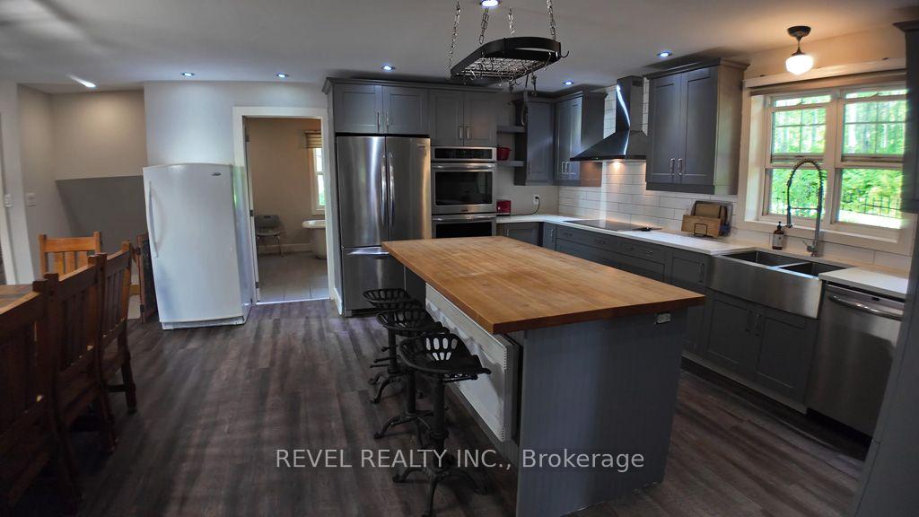 Photo 16 of 260 Racicot Road, Timmins, TM - Outside East — HOMEH