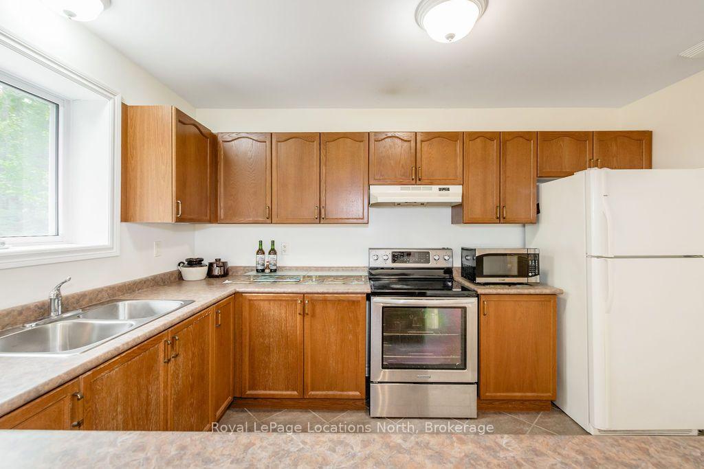 Photo 11 of 128 Spruce Street, Tiny, Rural Tiny — HOMEH