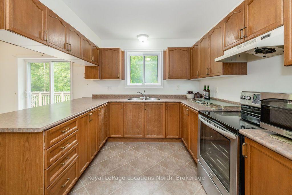 Photo 13 of 128 Spruce Street, Tiny, Rural Tiny — HOMEH