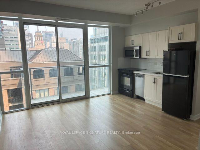 Photo 1 of Unit 1707, 126 Simcoe Street, Toronto, Waterfront Communities — HOMEH