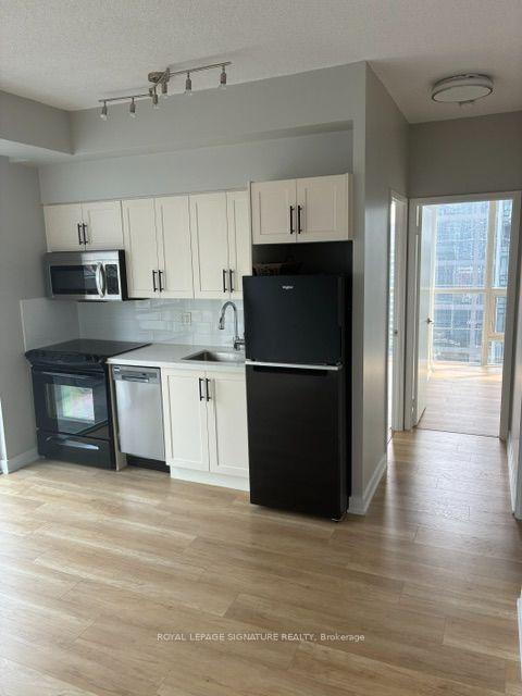 Photo 2 of Unit 1707, 126 Simcoe Street, Toronto, Waterfront Communities — HOMEH